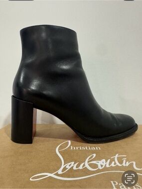 Christian Louboutins 
Adoxa 70,s
